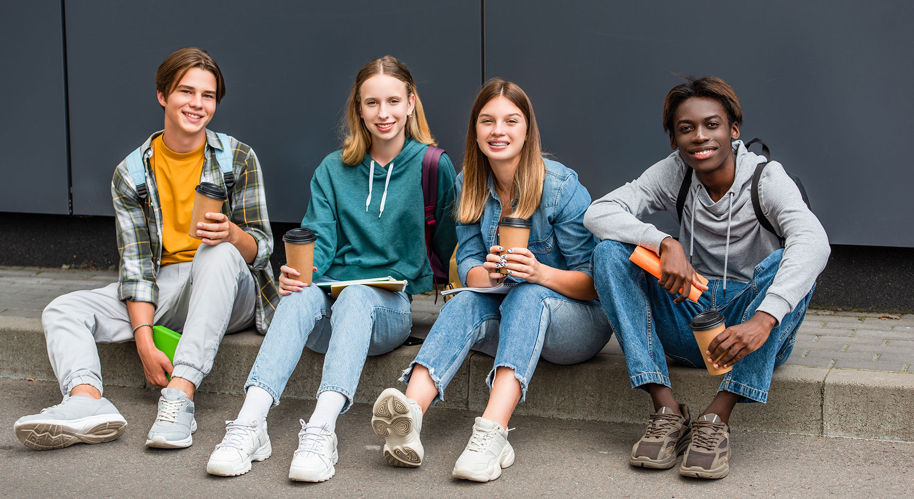 42823915-cheerful-multiethnic-teenagers-with-coffee-to-go-and.jpg