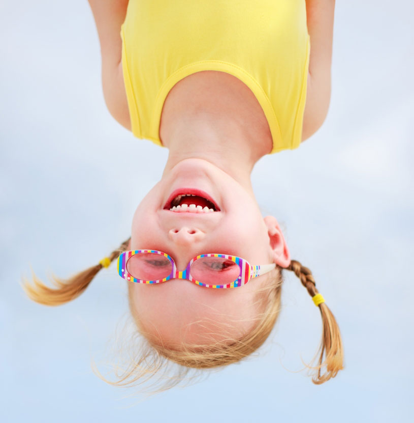 3167372-happy-little-girl-upside-down.jpg