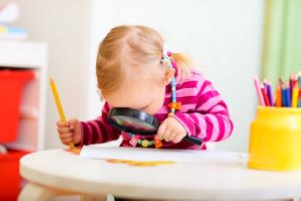 1707888-toddler-girl-looking-through-magnifier .jpg