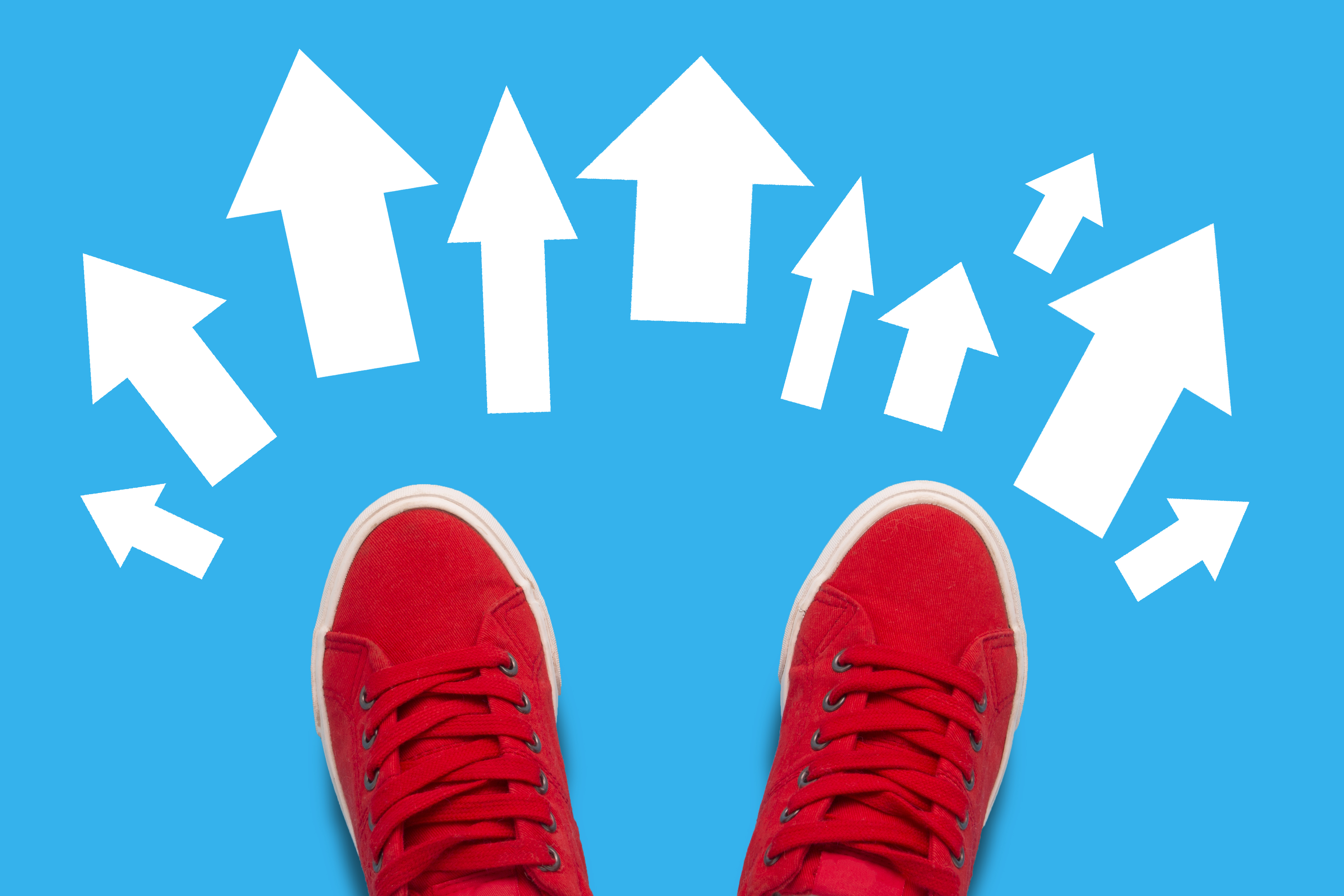 mp38251619-legs-in-red-sneakers-on-a-blue-background-and-a-lot-of.jpg